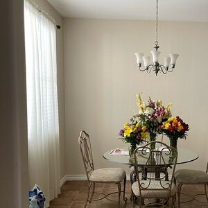 Cream colored sheer floor length curtains